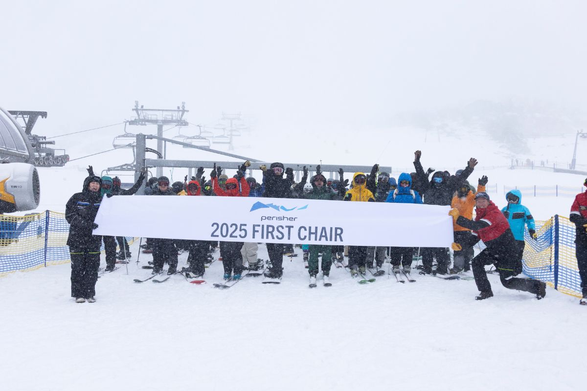 Skiers in fresh snow at Perisher 2025