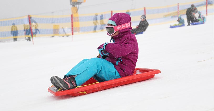 Girl Tobogganing Perisher